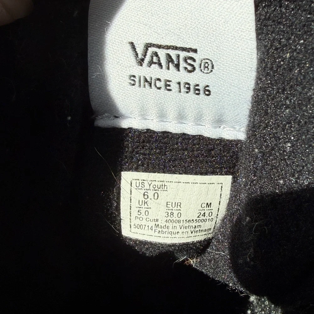 Vans Off The Wall Black and White High-Top Skate Sneakers